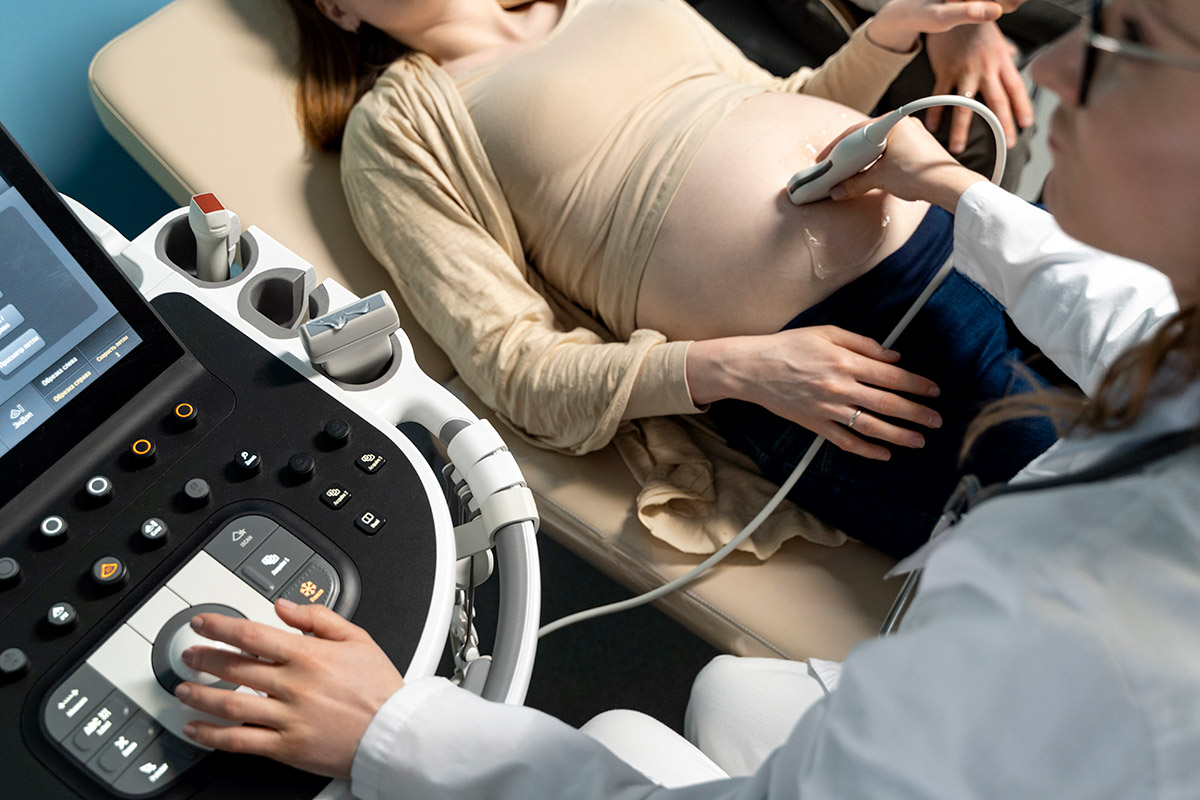gynecologist performing ultrasound consultation